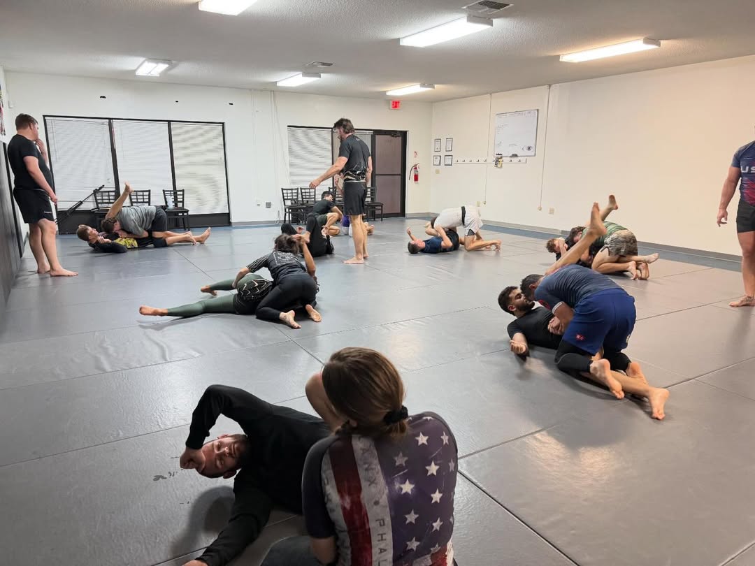 Members rolling on the mats at Insomnia Jiu Jitsu in Daytona Beach